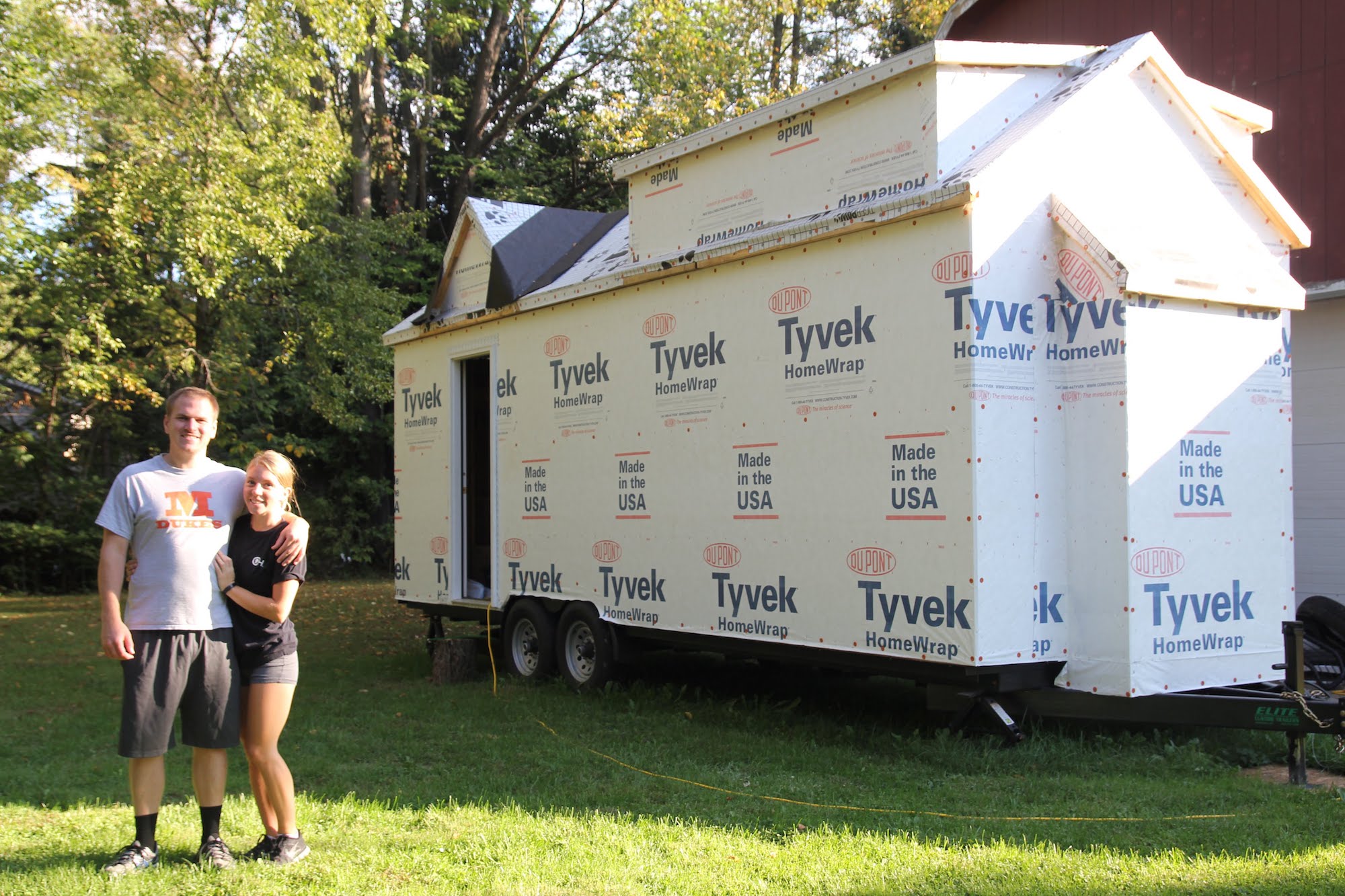 Amy and I outside the tiny house shell